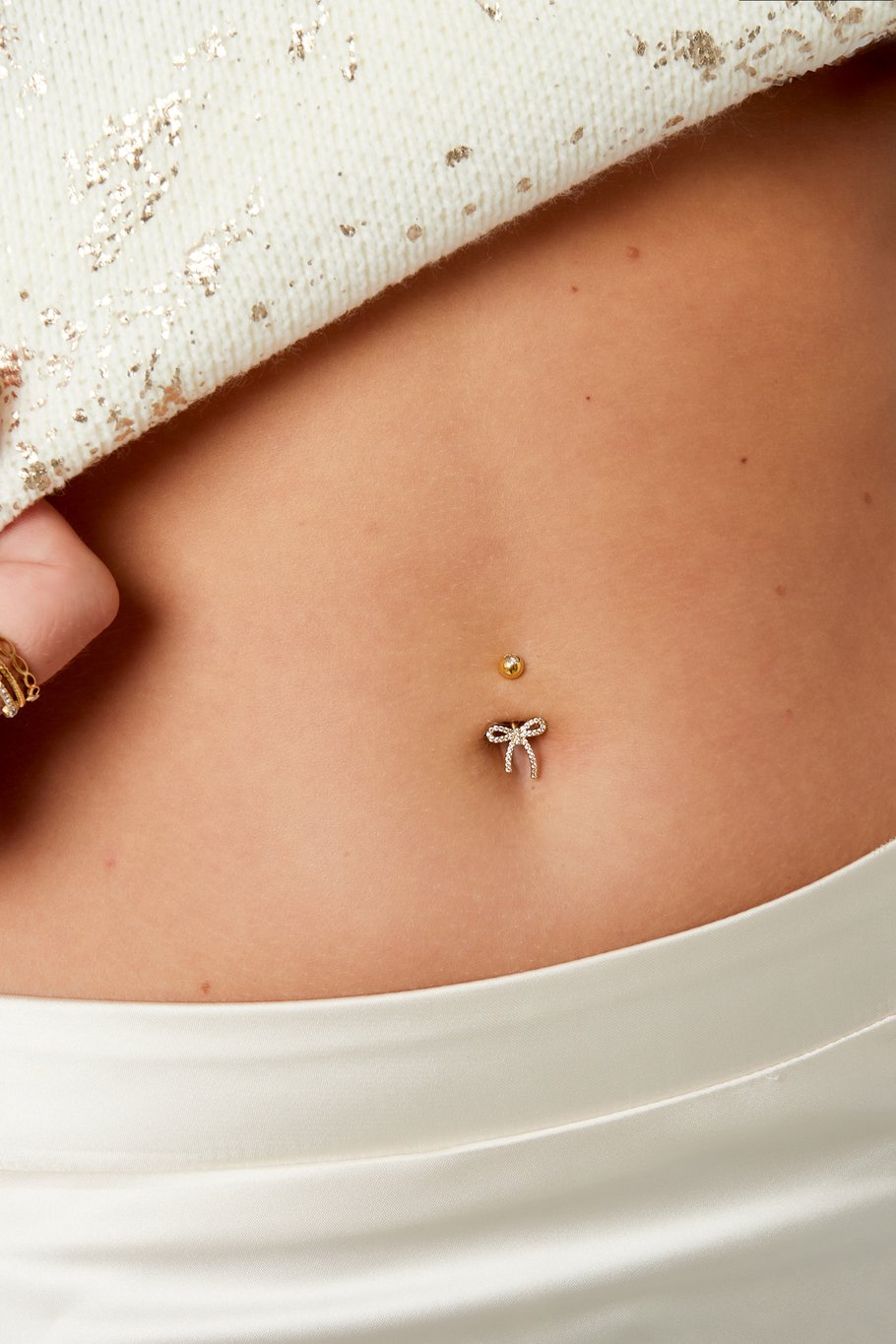 Bauchnabelpiercing Bow